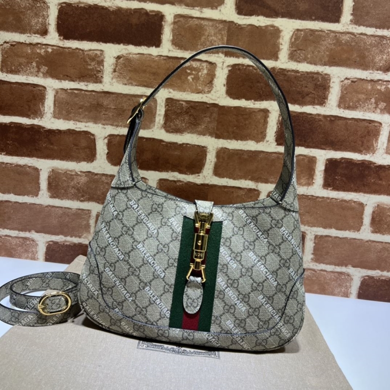 G*u*i top handle bags